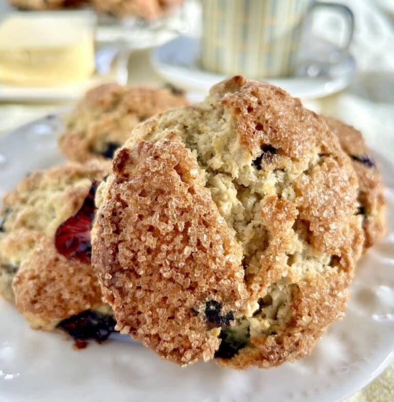 Blueberry Oatmeal Scones close up square cropped photo of sugar on top of a scone