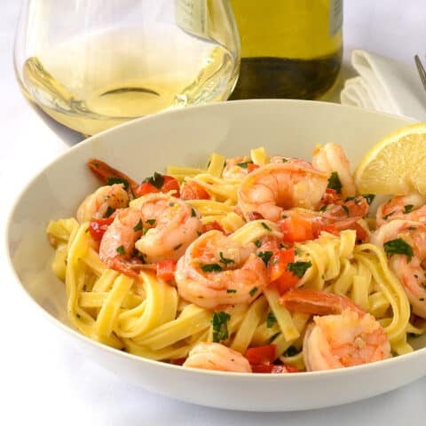 Super Simple Shrimp Scampi close up photo of a single serving in a white bowl