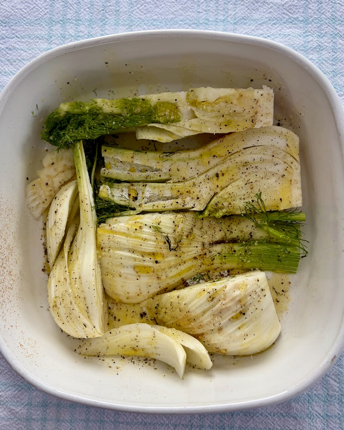Photo of seasoned fennel before roasting.