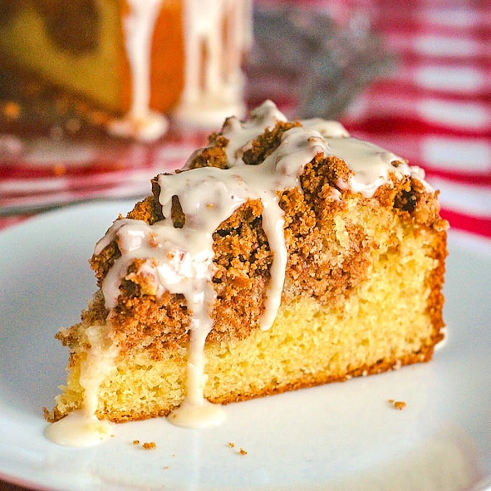 Pecan Streusel Coffee Cake close up photo of single slice on white plate