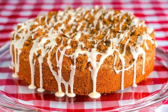 Pecan Streusel Coffee Cake close up photo of single slice on white plate