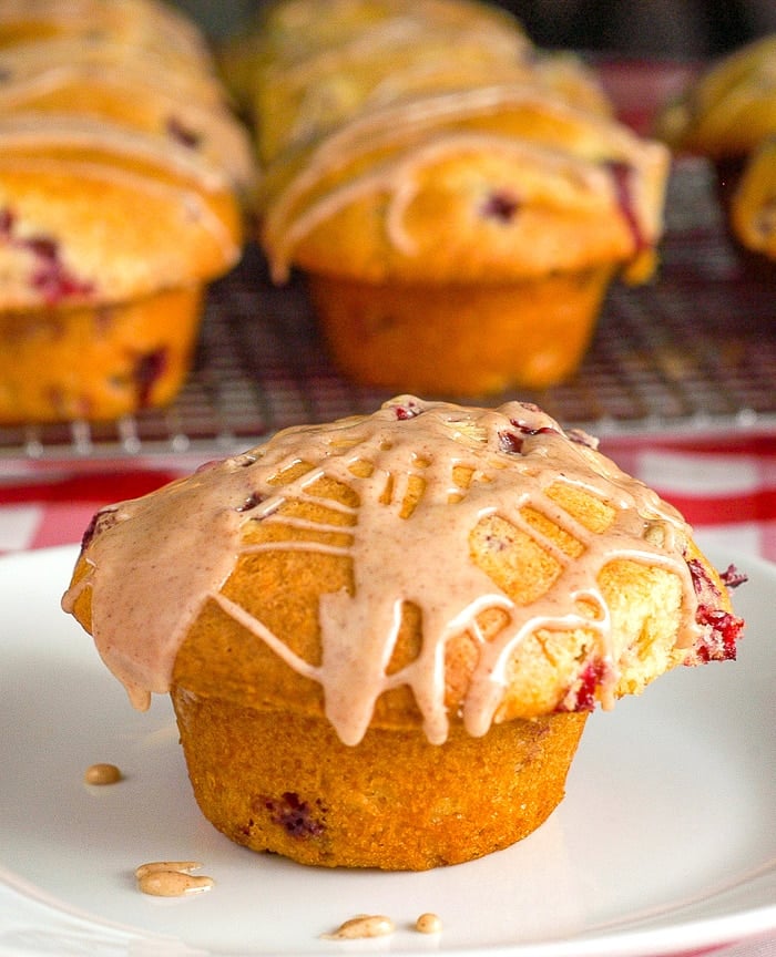 Cranberry Orange Muffins on white pla