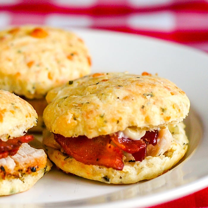 Cheese Garlic and Herb Scone Club Sandwiches close up image of a single sandwich