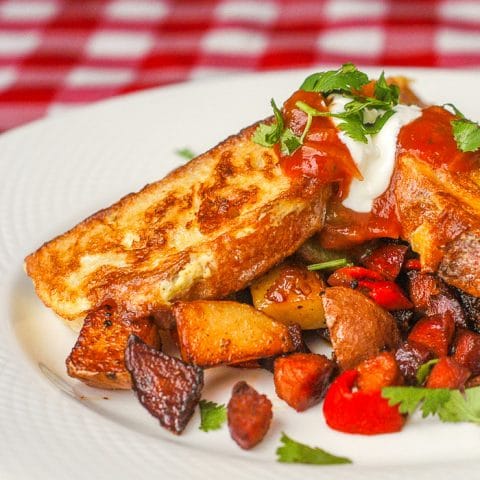 Chorizo Hash Browns with Spicy French Toast close up photo on white plate