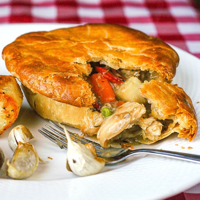 Turkey Pot Pie square croped featured image of pie cut open to reveal filling