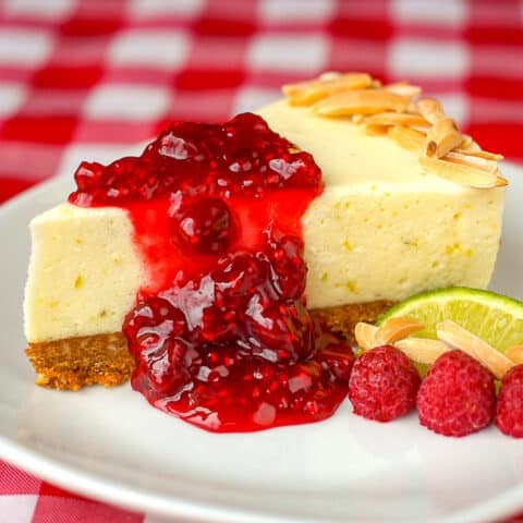 Lime Cheesecake Chiffon Pie with raspberries and lime slice for garnish