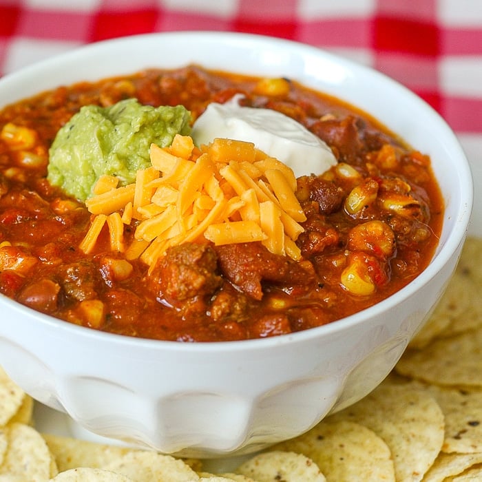 Grilled Corn Sausage Chili close up phoptpo of a single serving for featured image