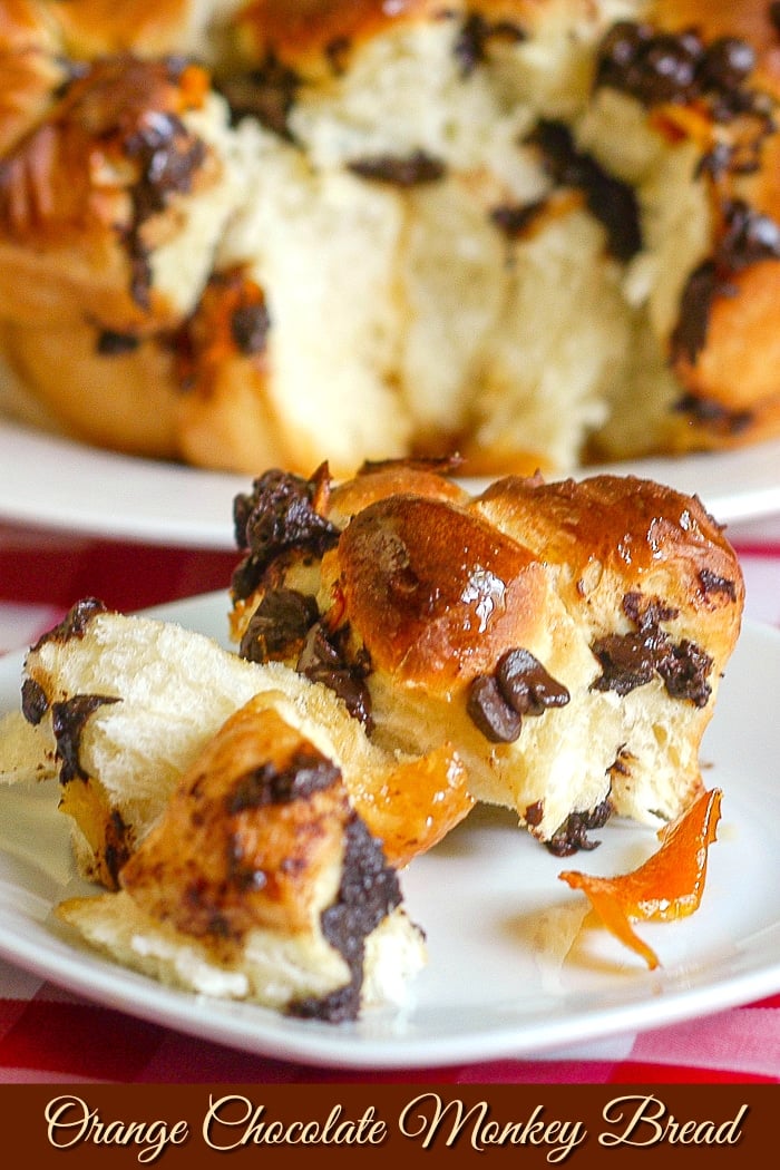 Orange Chocolate Monkey Bread photo of a single serving on a white plate with title text added for Pinterest