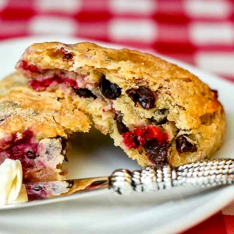 Chocolate Raspberry Scones photo of scones on a white plate for Google featured image.