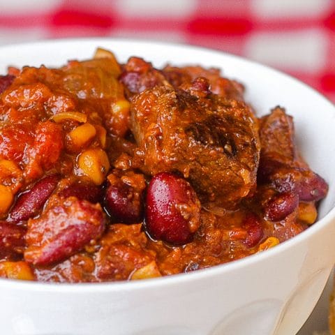 Beef Bacon Bean Stew close up image of stew in a white bowl