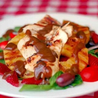 Grilled Pineapple and Chicken Salad photo of a single serving on a white plate