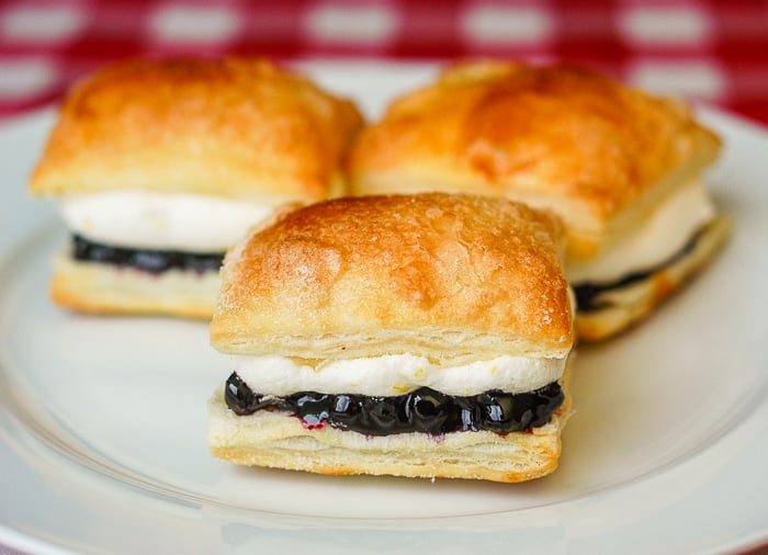 Blueberry Lemon Mini Puff Pastries on a white serving plate