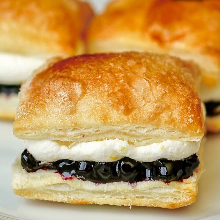 Blueberry Lemon Mini Puff Pastries aka Flakies close up photo of one pastry for featured google image.