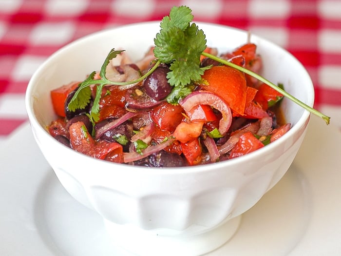 Tomato Olive Salad in a white bowl