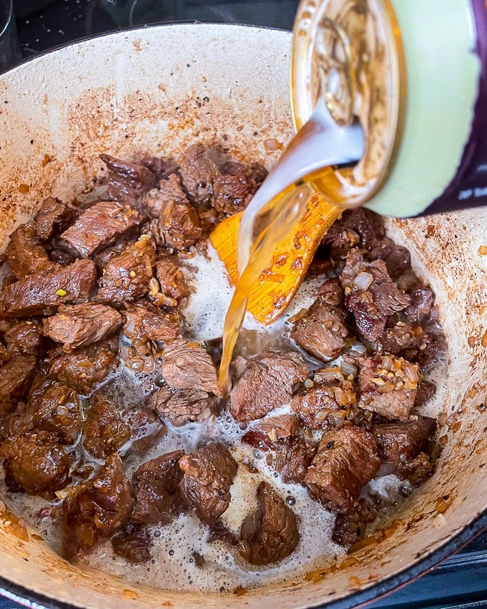 Adding the Irish Ale to the pot. Use more beef stock as a substitute if you like