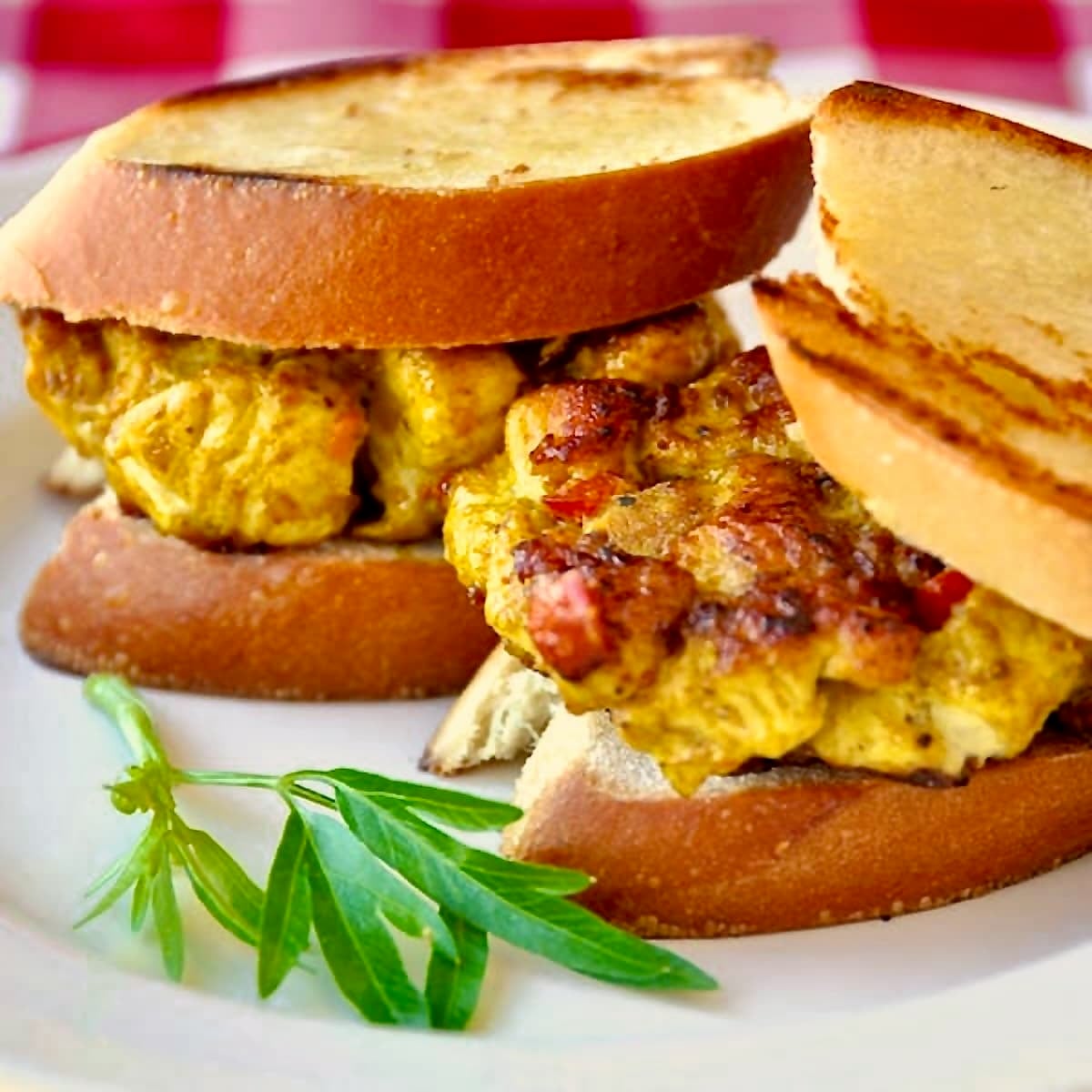 Curry Chicken Sliders, Close up photo of 2 sliders for featured Google image.