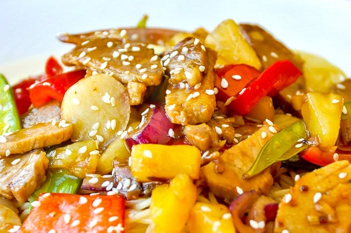 Easy Stir Fried Pineapple Pork close up image garnished with sesame seeds