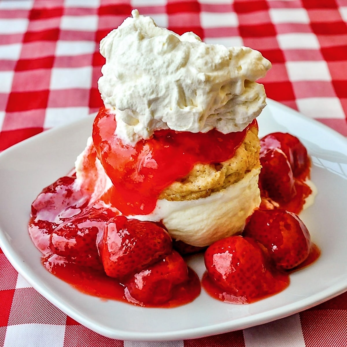 Strawberry Shortcake Sundaes photo of one serving on a white square plate featured image square