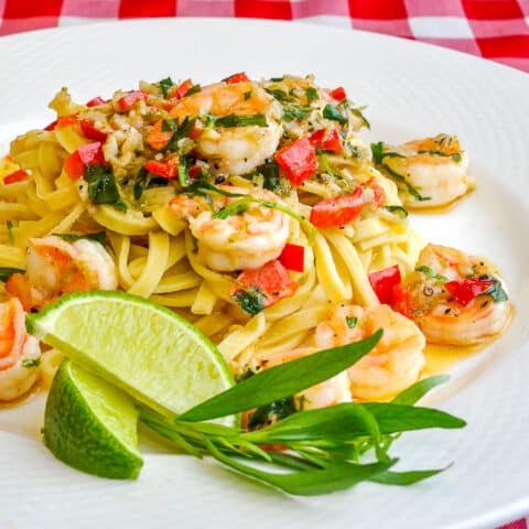 Tarragon Lime Shrimp Scampi pictured on a white plate