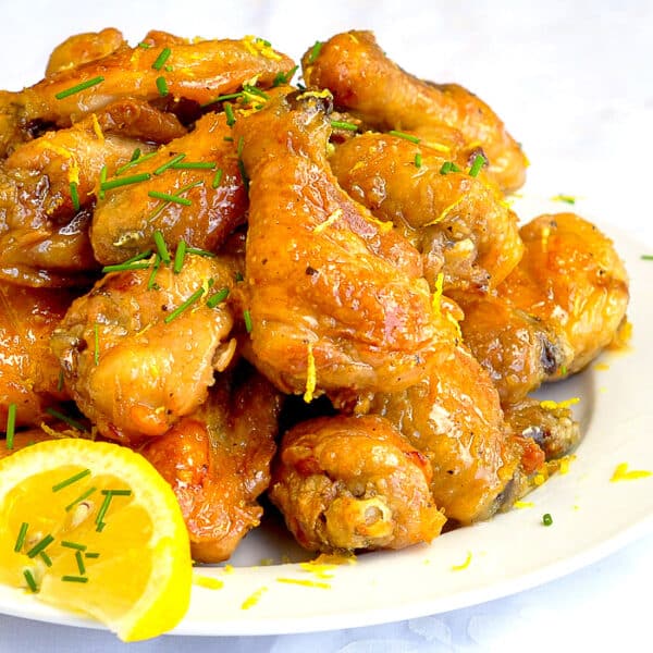 Baked Honey Lemon Glazed Wings. Crispy, sticky, lemony & delicious!