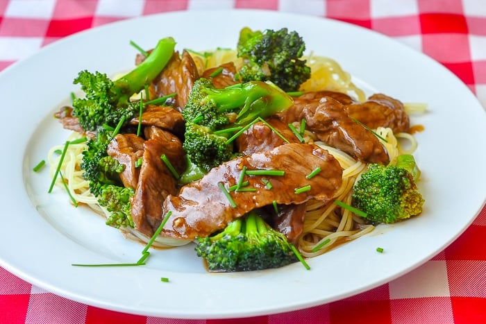 Beef & Broccoli on a white plate.