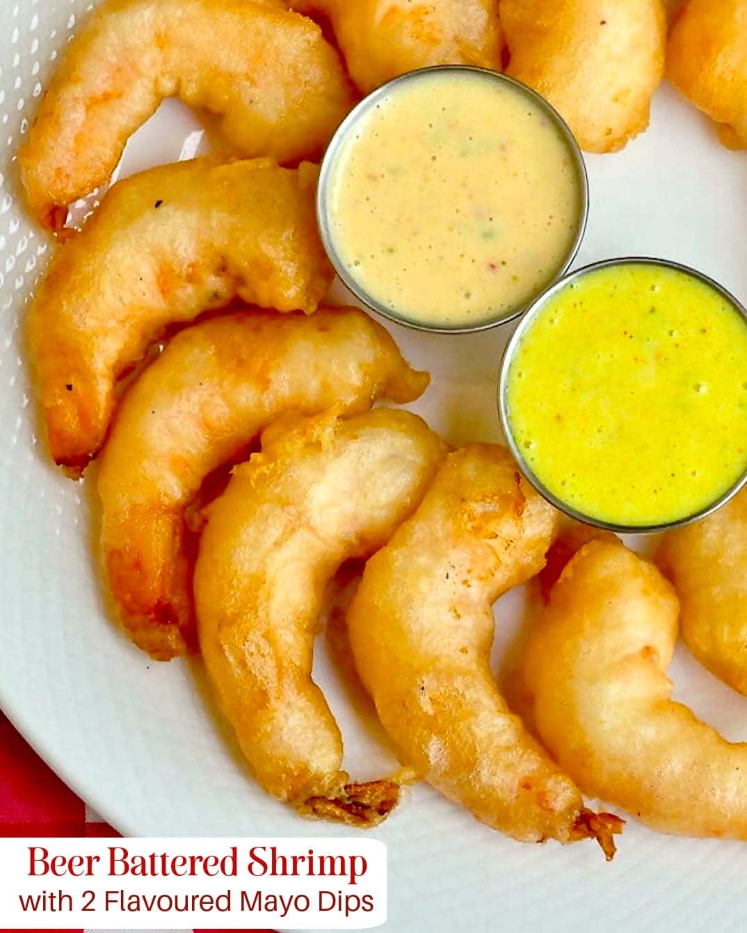 Beer Battered Shrimp photo of a platter of shrimp organized in a circle on a white platter with title text added for Pinterest and social media posts.