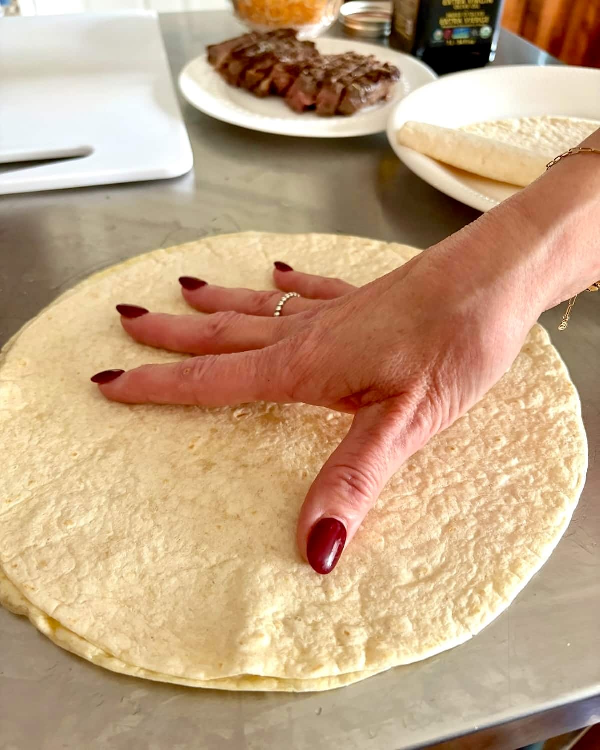 twisting the top tortilla