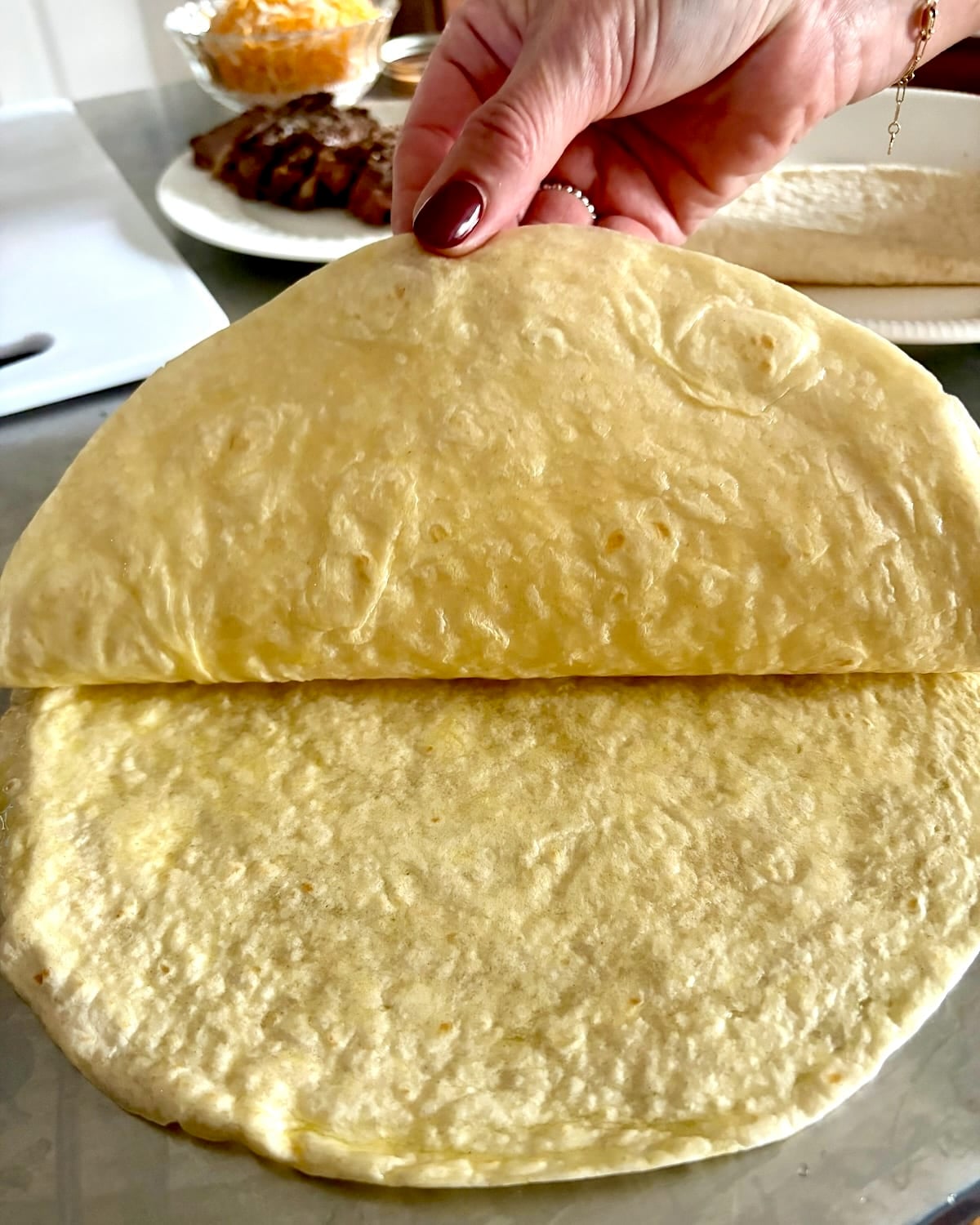 showing the dispersed oil on two tortills