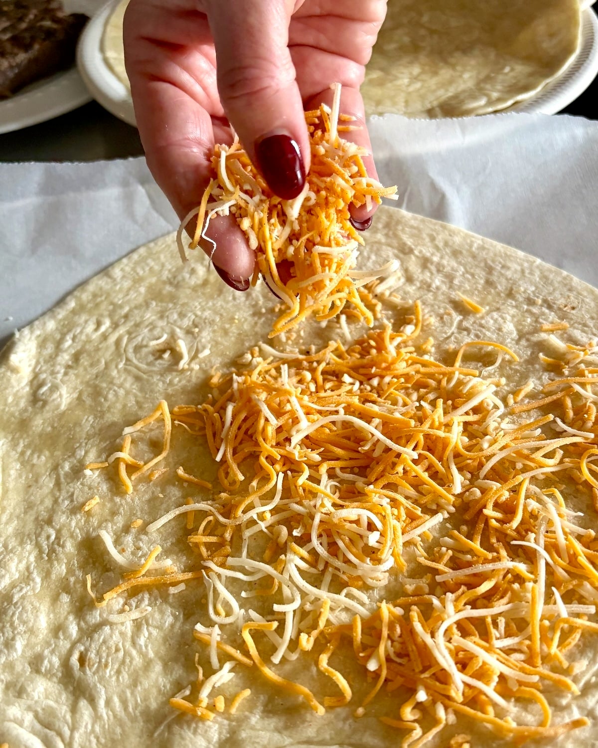 Add the first layer of cheese.