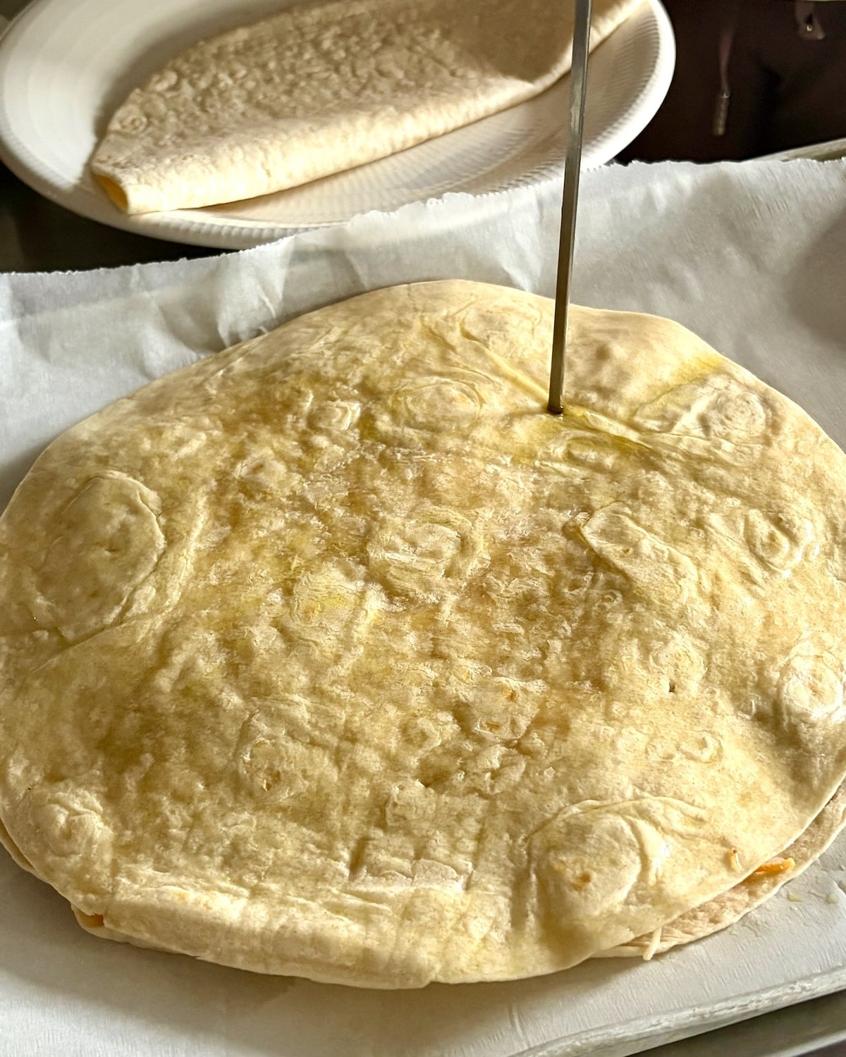 prick holes in the tortilla