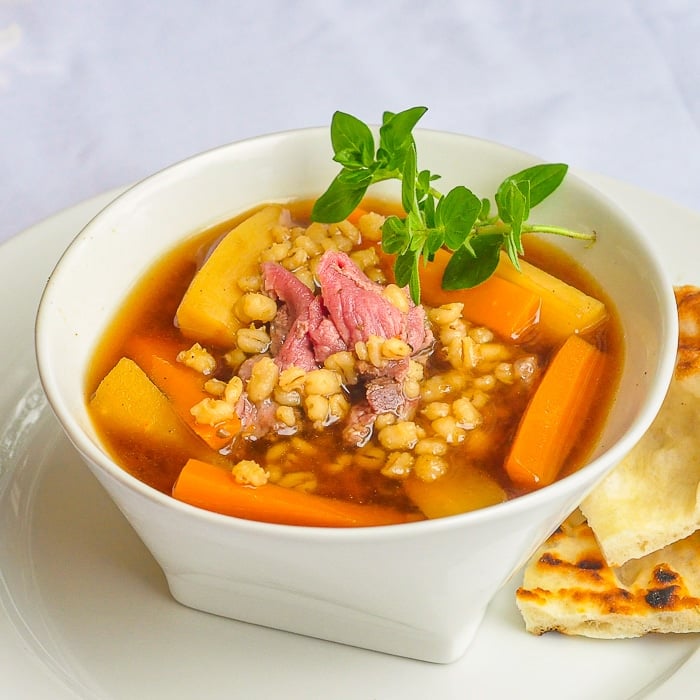 Steak and Barley Soup photo of a single serving in a white bowl