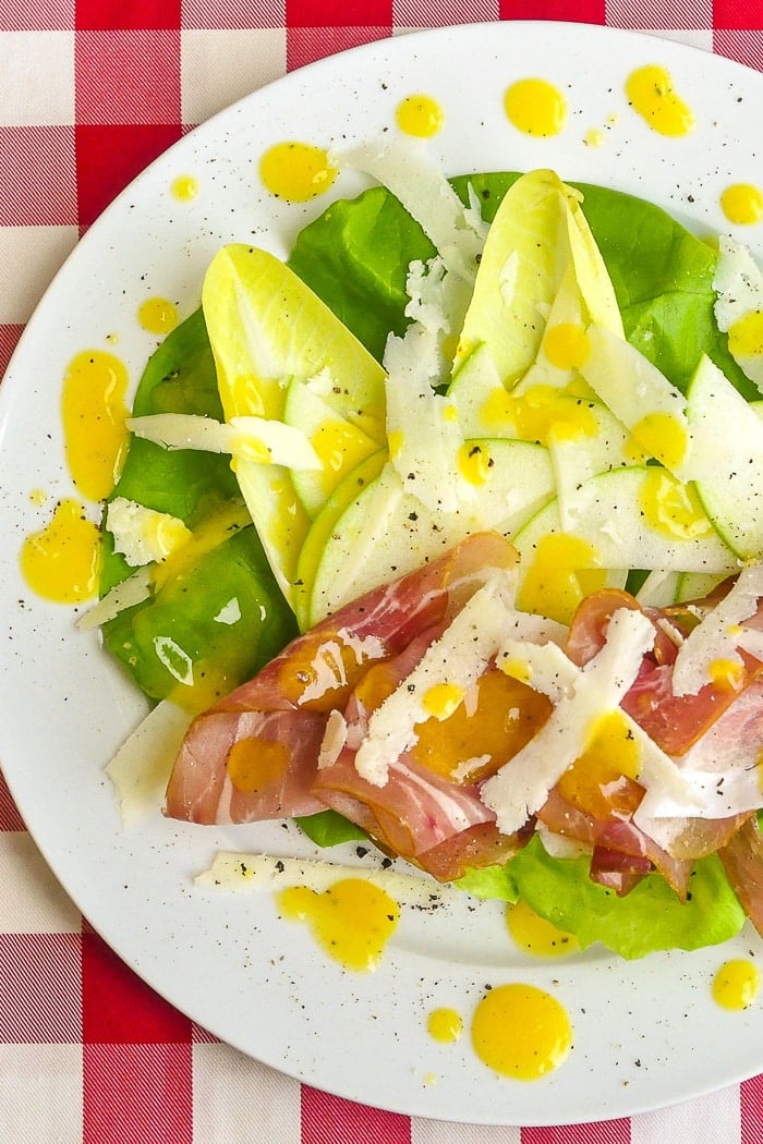 Mango Orange Dressing on Prosciutto Apple Salad long cropped photo for Pinterest