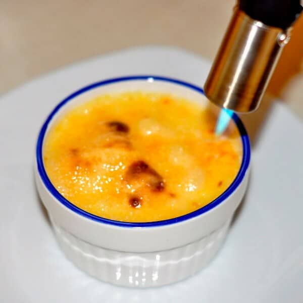 The Best Crème Brulée image with torch