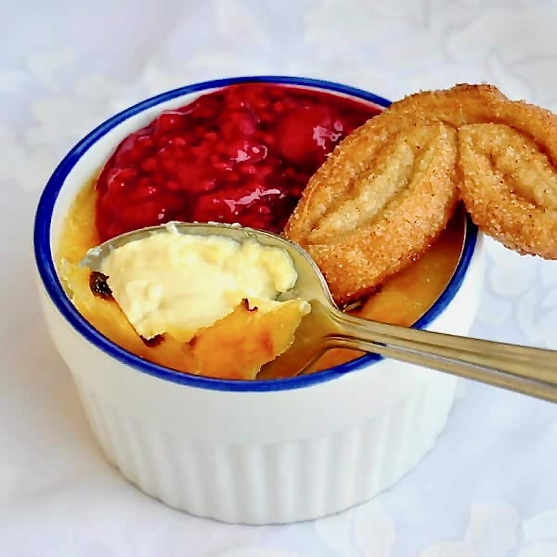 Cinnamon Palmiers with Raspberry Compote served with Creme Brulee .