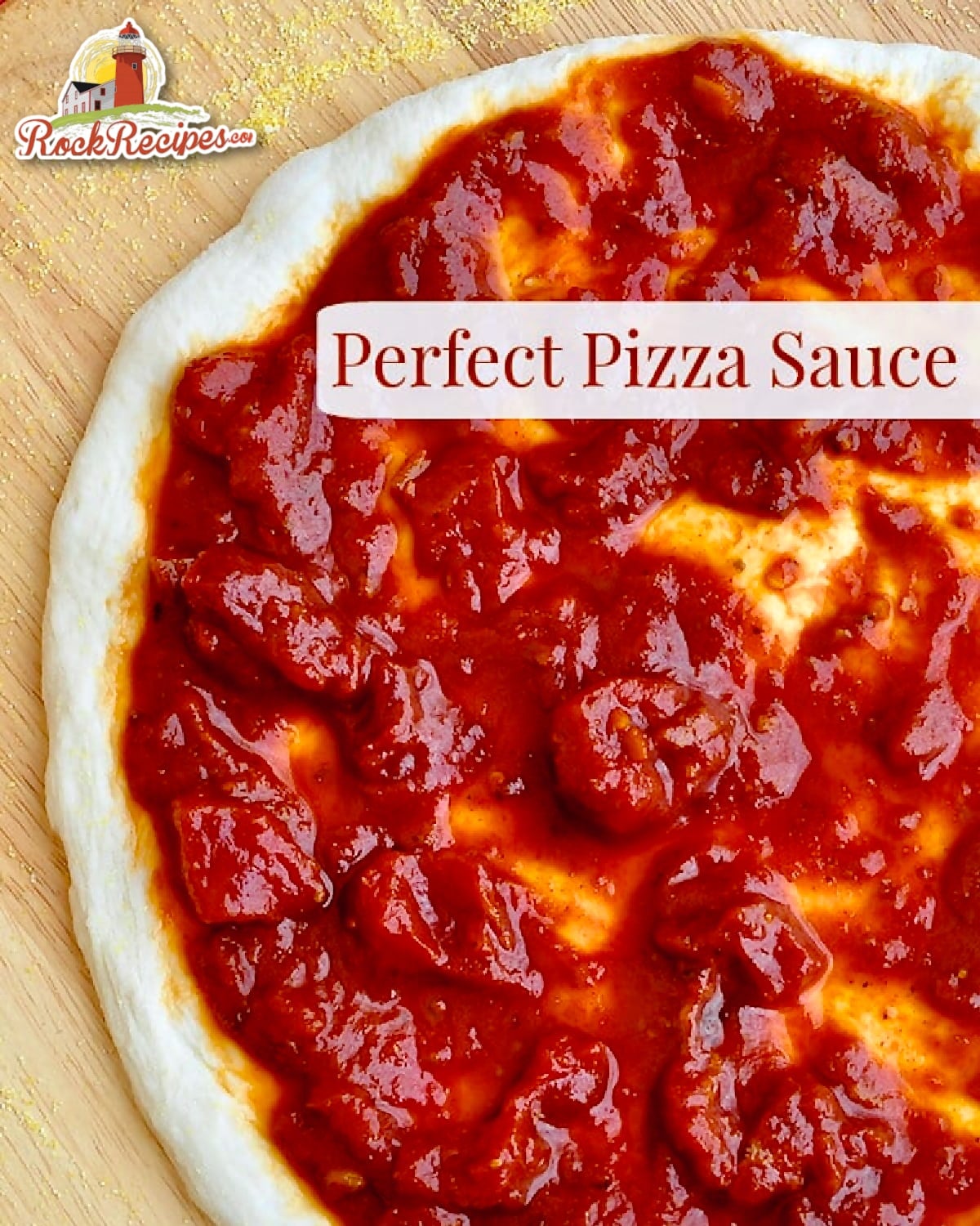 Perfect Pizza Sauce photo of sauce in stretched pizza dough with title text added for social media posts.