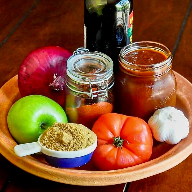 Brown Sugar Balsamic Barbecue Sauce photo of sauce surrounded by its ingredients.