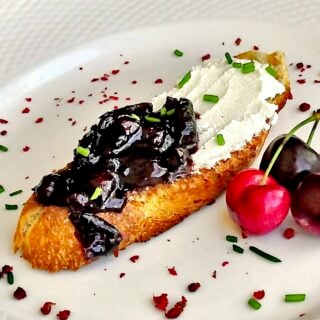 Goat Cheese Bruschetta with Roasted Cherry & Pink Peppercorn Jam.
