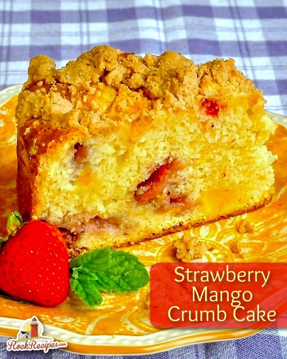 Strawberry Mango Crumb Cake close up photo of single slice with title text added for social media posts.