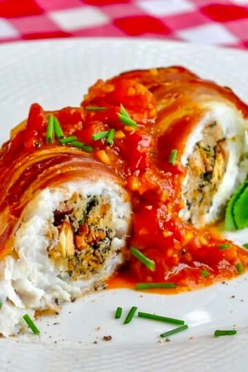 Stuffed Cod a la Empire close up of single serving on a white plate