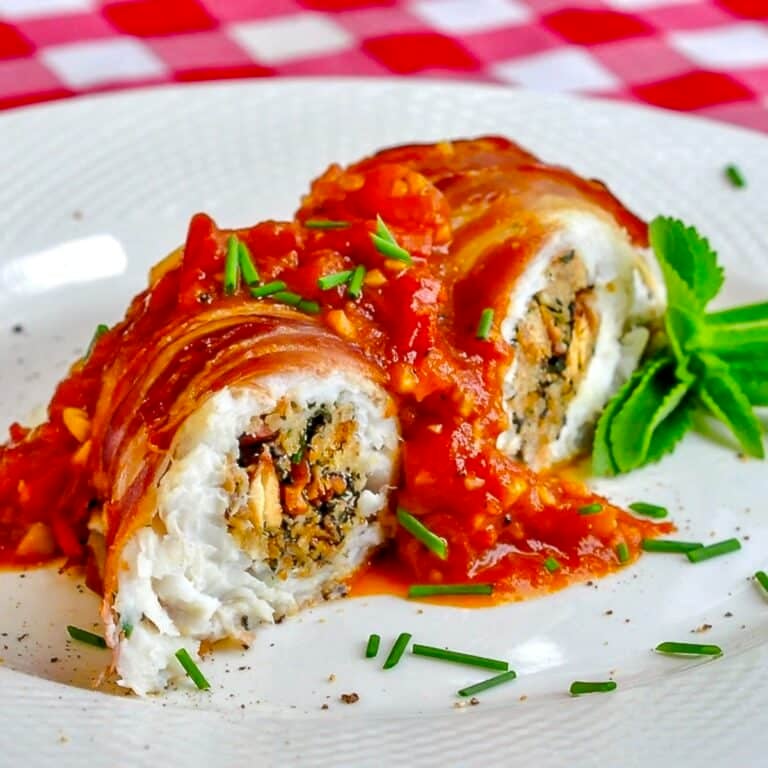 Stuffed Cod a la Empire close up of single serving on a white plate
