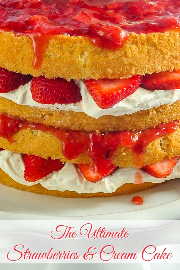 The Ultimate Strawberries and Cream Cake close up photo with title text for Pinterest