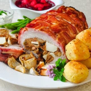Apple Almond Stuffed Pork Loin in a Bacon Blanket square cropped featured image