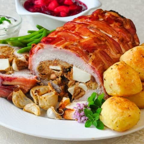 Apple Almond Stuffed Pork Loin in a Bacon Blanket square cropped featured image