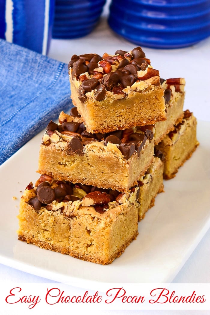 Chocolate Pecan Blondies on a white rectangular plate with title text added for Pinterest