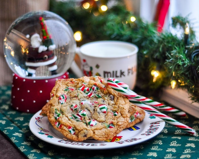 Chocolate Chip Candy Cane Cookies pictured with a glass of milk left out for Santa.