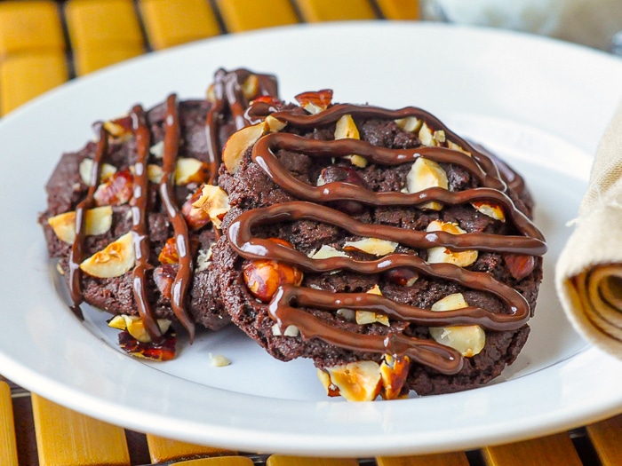 Nutella crunch cookies piled on a white plate