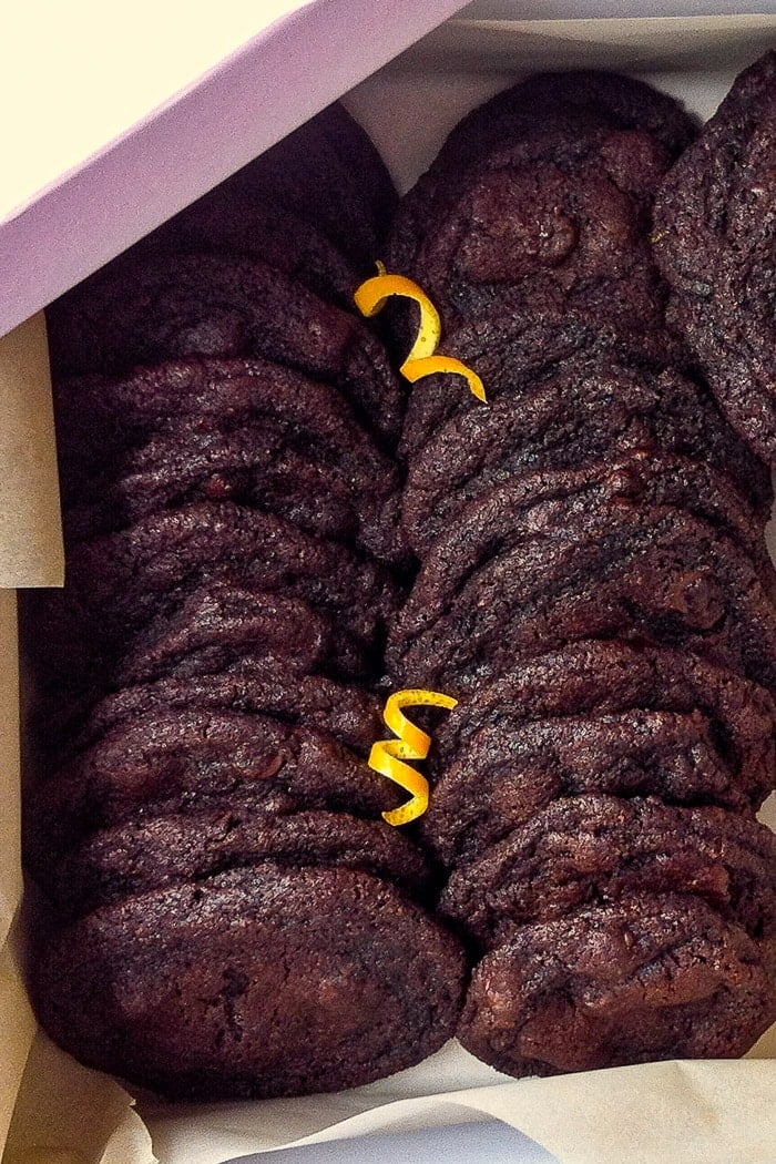 Orange Dark Chocolate Chip Cookies packaged with parchment paper in a gift box