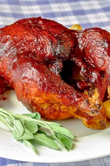 Maple Chipotle Barbecue Sauce shown on a whole barbecued chicken