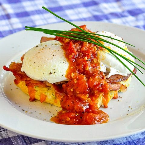 Cheddar Chive Biscuit Eggs Benedict photo of single serving on a white plate