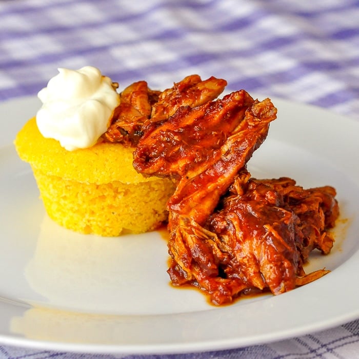 Chili Pulled Pork with Cornbread featued image of single serving on white plate